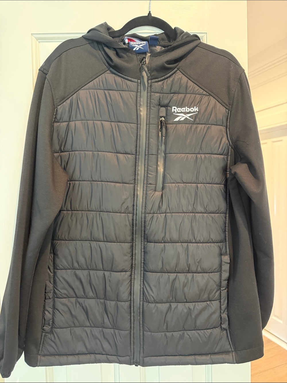 Reebok Men’s Black Quilted Hooded Puffer Jacket  new with out tags medium
